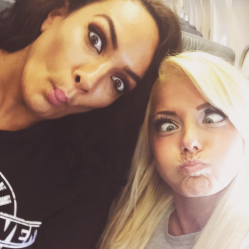 Alexa Bliss and Nia Jax of WWE making silly faces for the camera