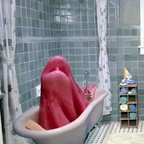 The mood slime from Ghostbusters 2 turns the bathtub into a monster, one which tries to eat Dana Barrett and her baby, Oscar