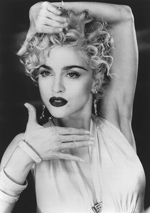 Madonna in music video for her hit single, "Vogue"