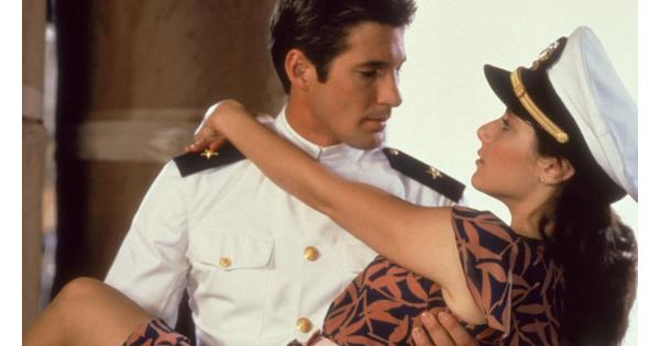 Richard Gere holds Debra Winger in his arms from the most popular scene of the 1980's movie, An Officer and a Gentleman