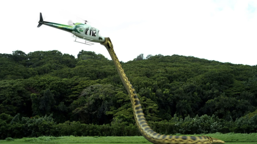 The piranhaconda from the movie of the same name snatches a helicopter out of the sky in its mouth